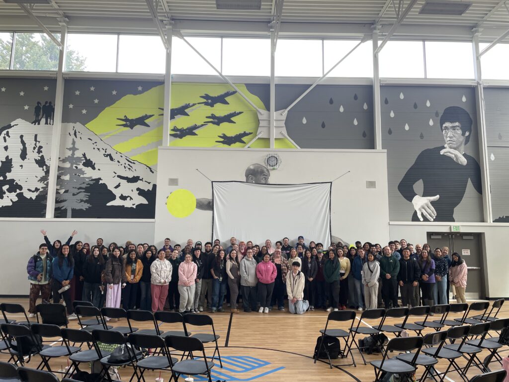 Staff standing together in a group.